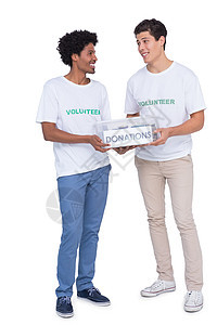 年轻微笑的青年志愿者募捐捐款快乐道德福利服务志愿混血男性捐赠帮助社会图片