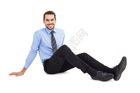 坐在地板上欢乐的商务人士图片