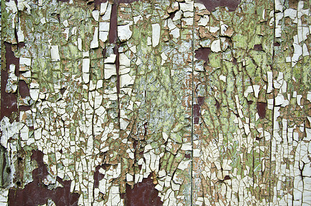木制门上破解的旧油漆背景背景图片