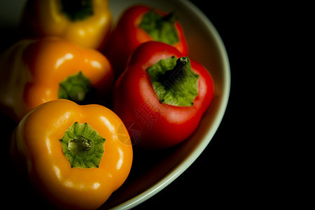 多彩胡椒数码蔬菜红色对象黄色背景饮食健康饮食橙子黑色图片