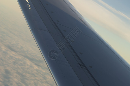 空中飞机在飞行中的天翼飞行翅膀天气飞机乘客场景日落柔软度平民飞行器目的地图片