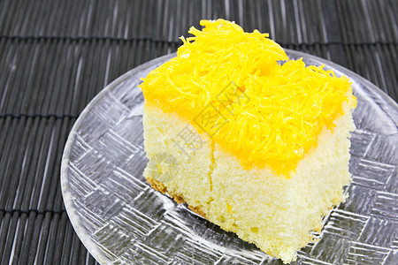 黄色小蛋糕蛋黄蛋糕 泰国甜点蛋黄蛋糕金子热带小吃盘子黄色食物美食背景