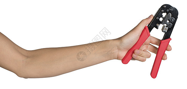 女性用手抓着电钳乐器硬件工具连接器维修金属水平卷边剪子手臂图片