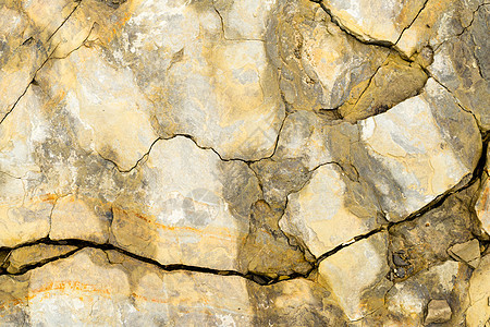 山河河床的含层岩表表 以及砂岩薄片叶片碎石地层裂缝沉积层压订金材料图片