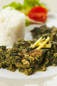与巴斯马提的印度菠菜咖哩绿色食物香米午餐美食烹饪香料蔬菜芝士沙拉图片