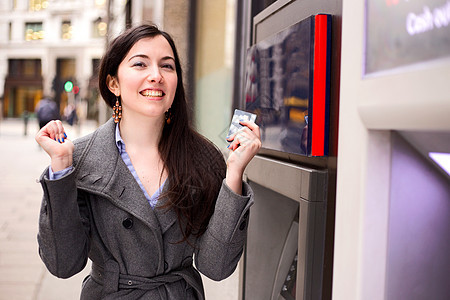现金机现金取款机街道平衡帐户银行业女孩服务微笑商业图片