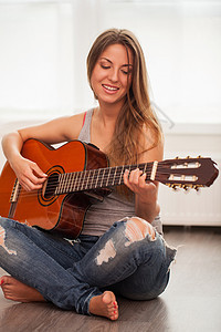 弹吉他年轻的年轻美女艺术家女孩青少年女性吉他手爱好乐器工作室女士星星图片