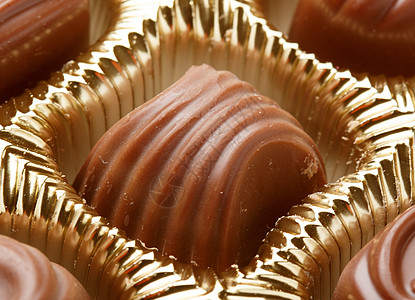 巧克力甜甜糖特写甜点烹饪蛋糕糖果口粮大豆纯牛奶蛴螬食物减肥背景图片