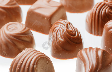 巧克力甜甜糖特写盒装夹心纯牛奶口粮减肥糖果蛋糕大豆烹饪食物背景图片