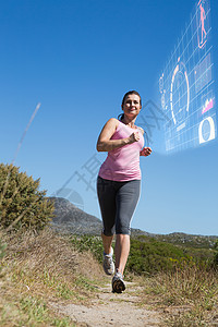 农村积极妇女慢跑的复合形象图象勘探计算环境技术科技登山阳光训练踪迹蓝天图片