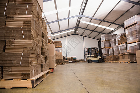 大型仓库的叉车地面商业货物送货运输配送工业包装工厂商品图片