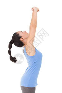 漂亮的黑褐发 伸展她的双臂调子锻炼女性棕色身体快乐运动拉伸女士微笑图片