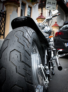 摩托车轮黑色车辆圆形轮缘旅行摩托车橡皮菜刀车轮运输背景图片