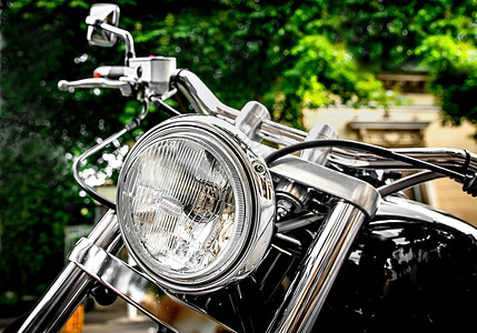 摩托车车头灯菜刀黑色大灯圆形旅行背景图片