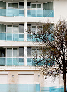 现代公寓玻璃建筑建筑学车库阳台元素都市风光外观特色图片