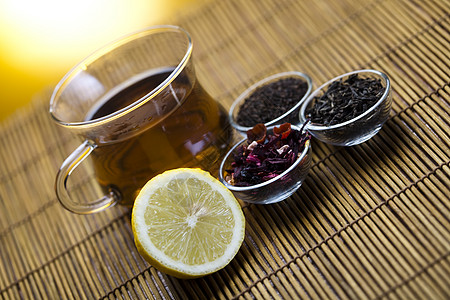 一杯茶与茶壶玻璃衬套草本植物饮料农业金子文化树叶传统定居图片