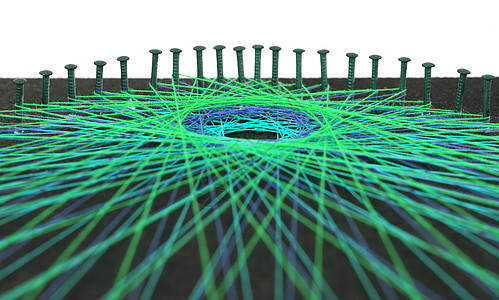 显示彩色线索工艺纺织品金属衣服绿色缝纫别针棉布宏观指甲背景图片