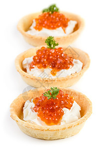 鱼子酱点心派对橙子熏制食物奶油自助餐美食面包香菜红色图片
