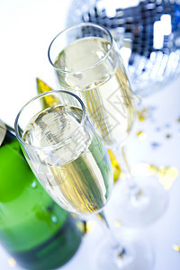 香槟 明亮多彩的生动主题庆典嘶嘶花环桌子装饰瓶子蓝色风格饮料火花图片