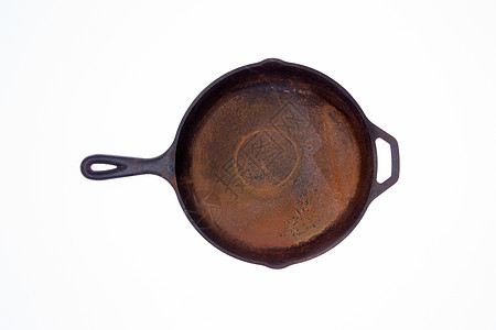 旧生锈的圆环铸铁煎锅图片