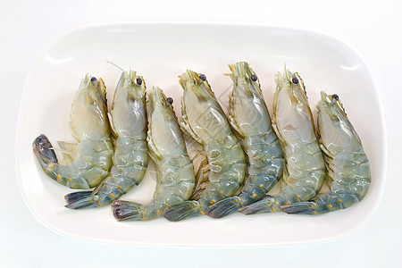 准备接受烧烤的新鲜海湾海虾绿色水果贝类营养午餐小吃草药桌子寿司食物图片