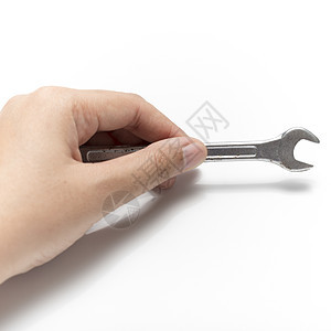 手握扳手工人维修硬件机器工具工业金属手指工作服务图片