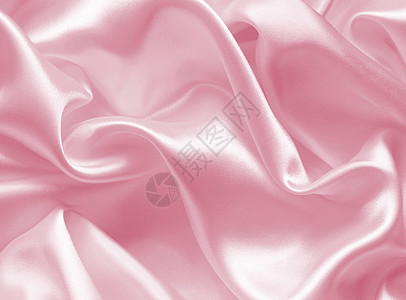 平滑 优雅的粉色丝绸或作为婚礼背景的沙子窗帘投标材料海浪织物曲线折叠紫丁香版税玫瑰图片