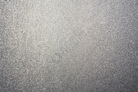 银灰或沙地背景摘要奢华亮度光泽度灰尘魔法空白材料微光辉光金属图片
