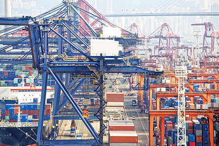 港口贸易在香港商业港口的集装箱进口仓库旅行加载载体货运贸易起重机货物服务背景