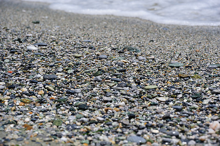 海的石子 沙滩海岸线冲浪侵蚀支撑海浪海岸巨石材料假期日落背景