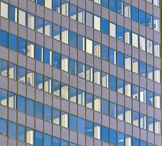 现代办公楼房子玻璃办公室天空商业城市反射建筑蓝色背景图片