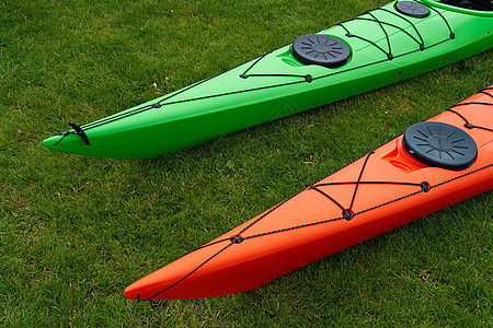 海滩上多彩多彩的皮艇划桨假期娱乐旅游海岸支撑活动训练海洋闲暇图片