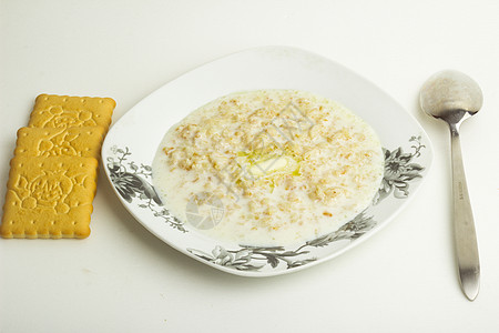 碗里煮粥饼干食物早餐稀饭黄油乡村美食产品营养饮食图片