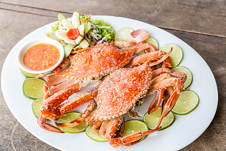 蒸螃蟹海鲜盘子食物绿色美食蒸汽红色烹饪桌子柠檬餐厅背景图片