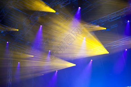 灯光表演展示黄色居住聚光灯头灯舞台蓝色设备文化激光背景图片