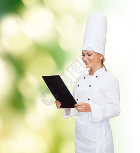 带黑白纸 微笑着的女厨师食谱助手餐厅广告服务女孩床单女性女士帽子图片