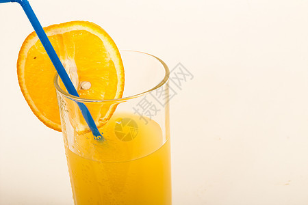 橙汁果汁黄色蓝色白色橙子水果食物玻璃飞溅图片