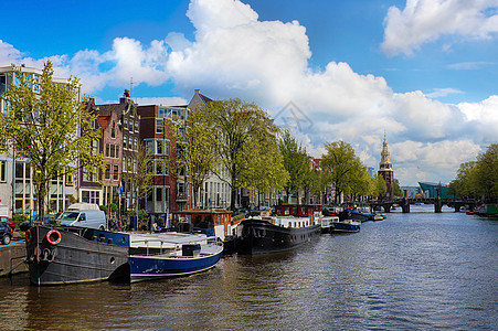 荷兰阿姆斯特丹老城的运河项目天空旅游船只运河漂浮住宅旅行街道自行车反射图片