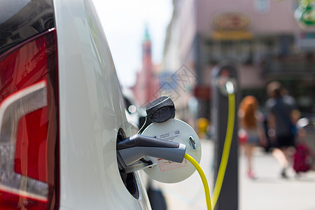 充电站的电动车绿色电源线能源插头插座充电燃料杂交种电源经济图片