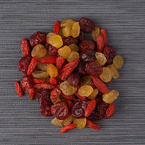 混合干果的圆环食物团体水果工作室橙子宏观棕色红色饮食营养背景图片