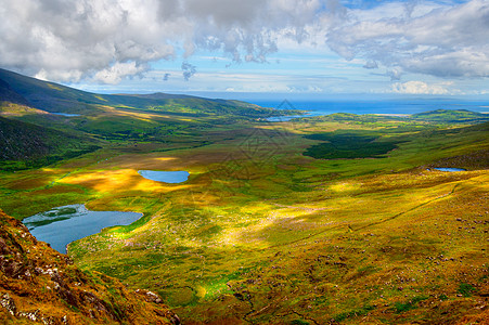 Dingle半岛的国别一角国家山脉蓝色草地地平线场景环境风景旅行爬坡图片