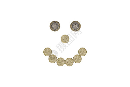 一磅硬币的微笑面容经济水平货币财政储蓄金融金钱图片