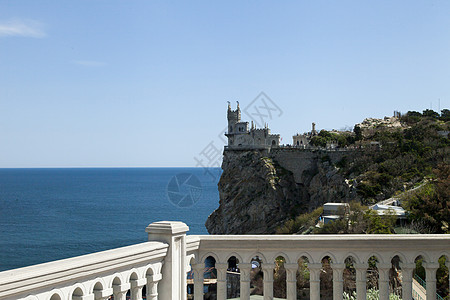 海边的城堡日出历史性日落爬坡燕子蓝色悬崖建筑学运输天空图片