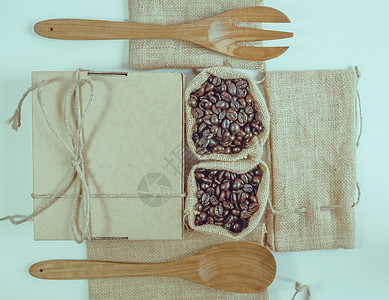 咖啡豆木勺和麻袋表面的叉子美食棕色粮食麻布勺子咖啡解雇木头食物图片