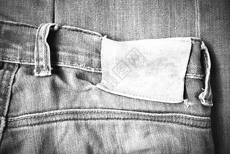 Jean裤子上的标签 黑白音调颜色样式皮革框架牛仔裤空白服饰衣服织物贴纸蓝色牛仔布图片