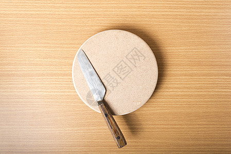 刀和刀板金属烹饪工具屠夫木头厨师棕色厨房木板用具图片