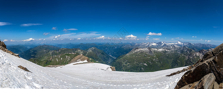 雪山全景蓝色顶峰冰川滑雪假期地标爬坡天空远足环境图片