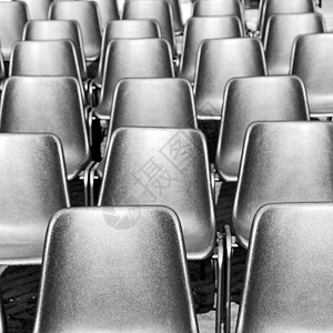 依欧洲语背景黑色纹理中的空席位观众沥青音乐体育场椅子褪色论坛座位墙纸人行道图片