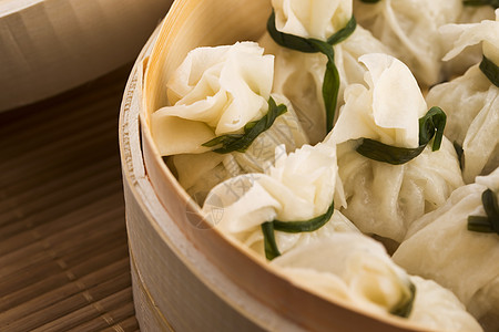 竹蒸汽船中中国的燕子饺子水梅竹子食物时间猪肉水脉点心饮茶盘子图片