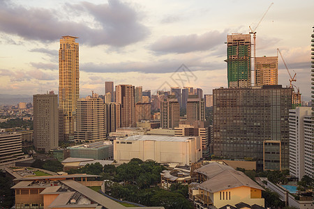 菲律宾大马尼拉大马尼拉银行公寓建筑学村庄黄金摩天大楼景观日落玻璃土地图片